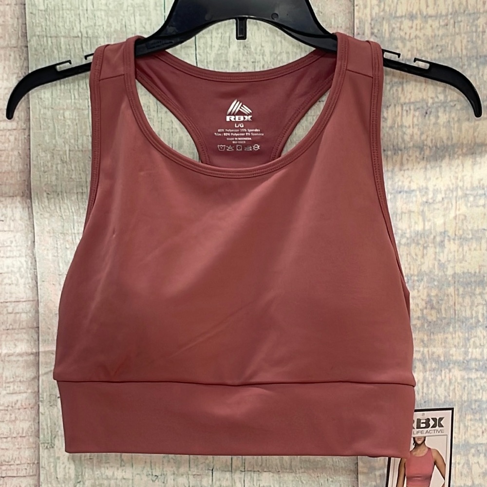 - Brand new with tags Woman’s RBX bra. Size is Large.